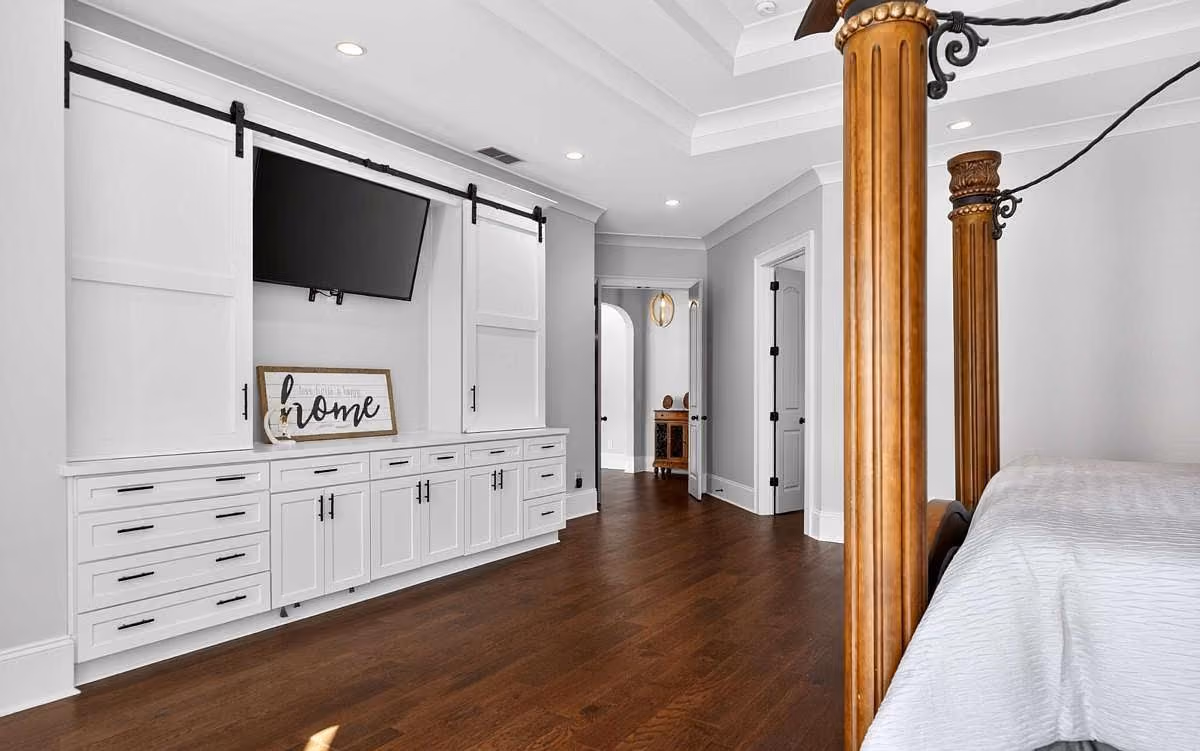 Built-in cabinetry wall with a run of painted drawers