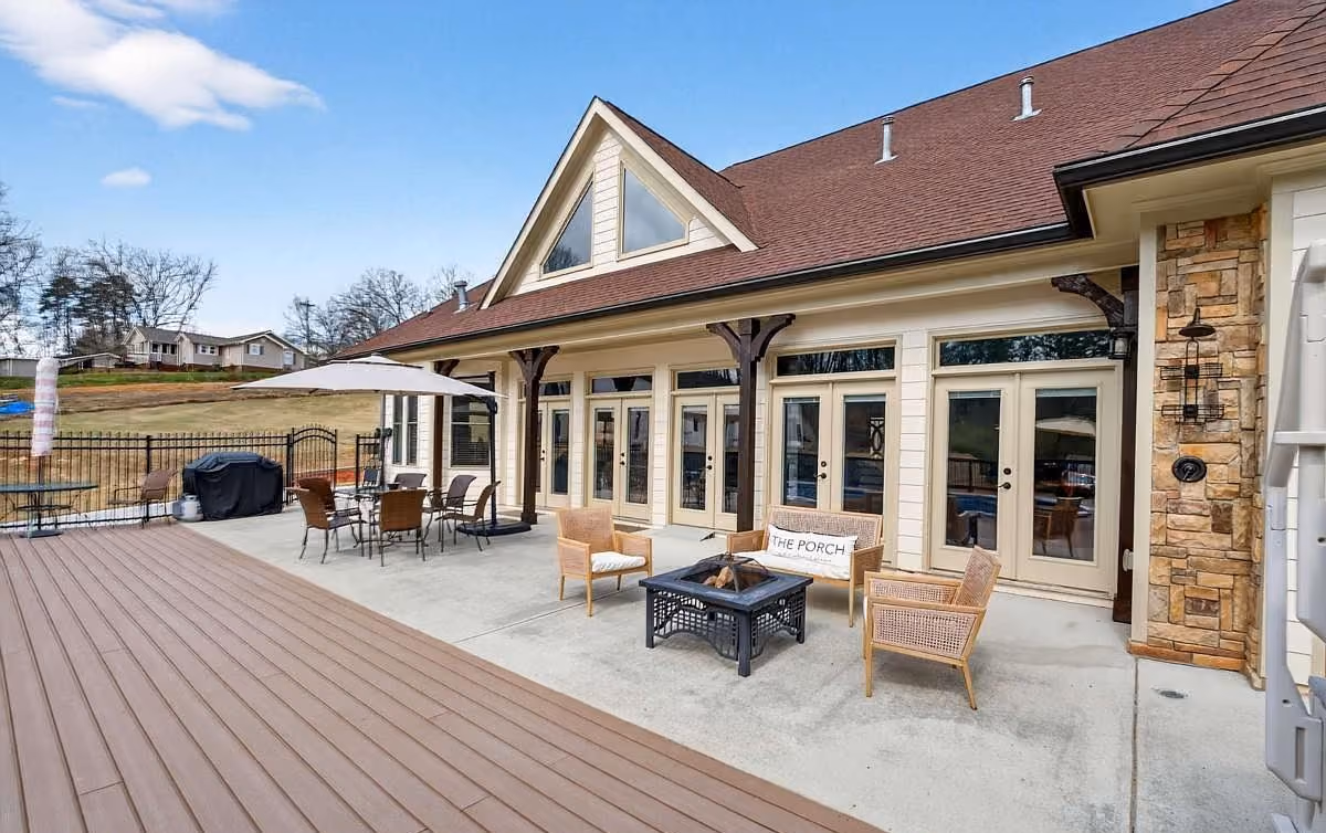 Composite deck and covered patio at the rear of a home