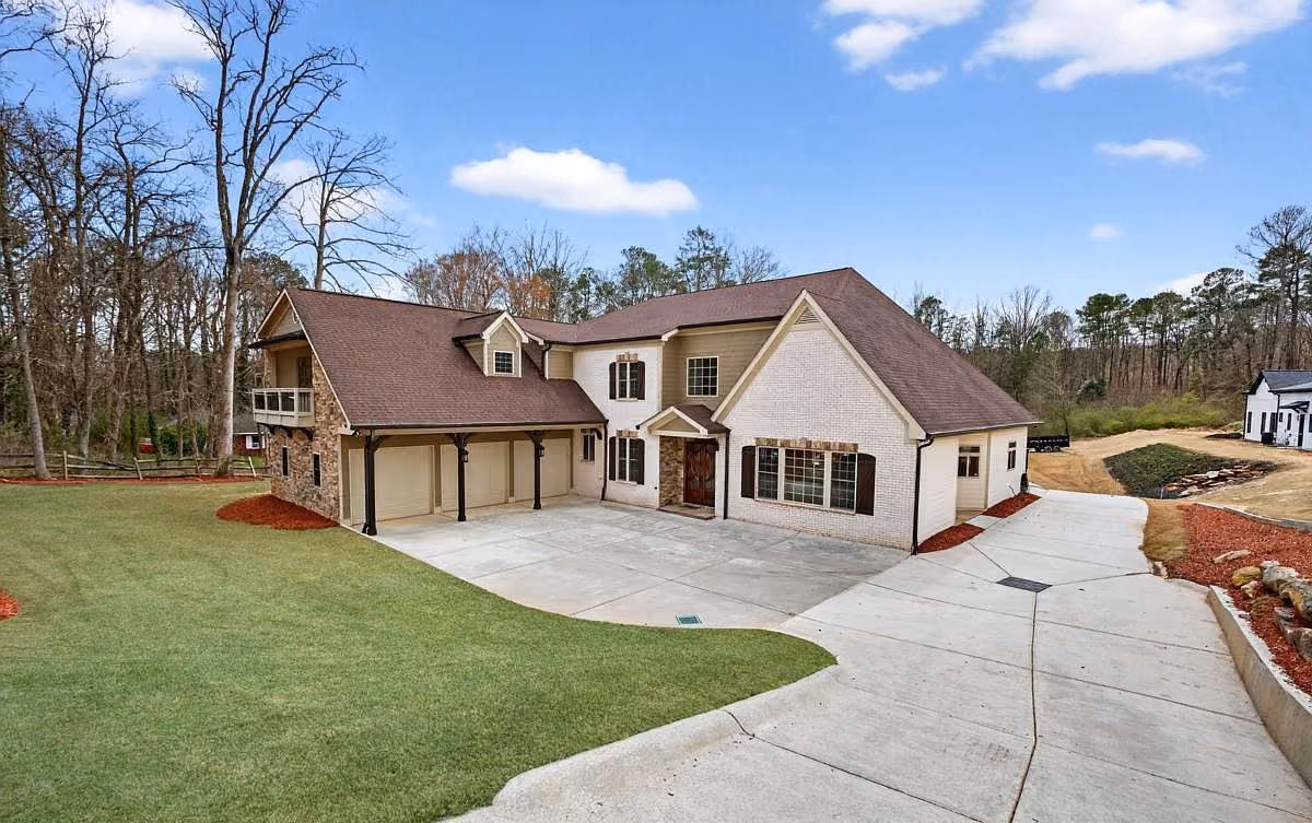 Front elevation and driveway of a custom home built in Buford